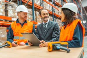 Employee talking with temporary on site staffing agency